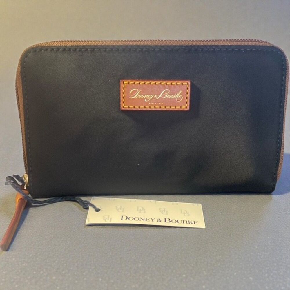 Dooney & Bourke black nylon and brown leather trim zip-around wallet. NWT